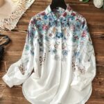 Women’s Floral Print Long-Sleeve Shirt – Elegant Loose-Fit Button-Up Blouse with Front Pockets, Featuring Blue and Red Flower Patterns on White Fabric, Perfect for Effortless Fall and Winter Casual Style